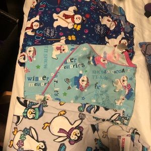 Medium scrub tops winter theme